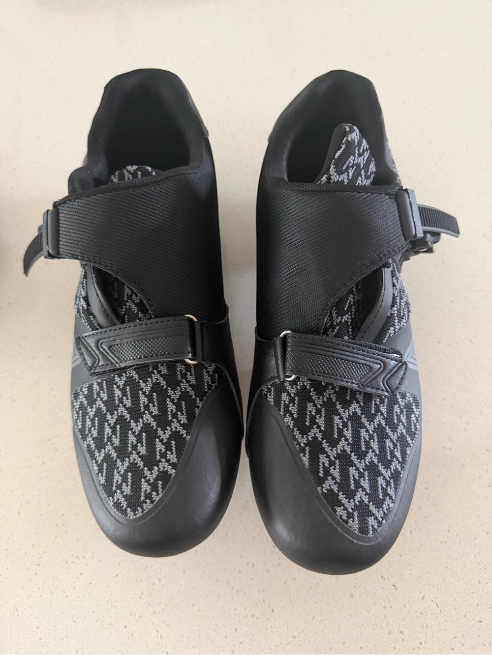 Black Patterned Slip-On Sneakers with Strap Closure